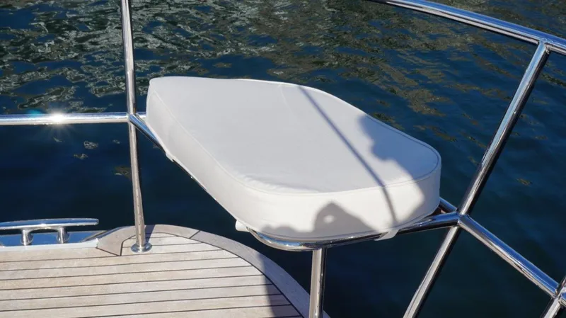 Slide: The Image of Cushioned seat on 2008 Oyster 46 yacht, overlooking water. - 21