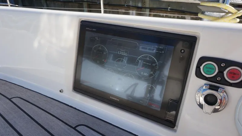 Slide: The Image of Control panel on a 2008 Oyster 46 yacht, featuring a Garmin display. - 25