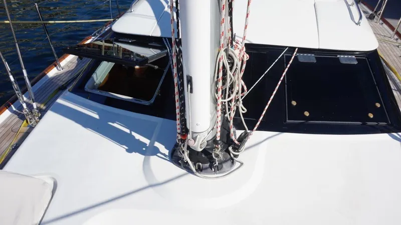 Slide: The Image of Deck view of 2008 Oyster 46 sailboat with mast and open hatch. - 26