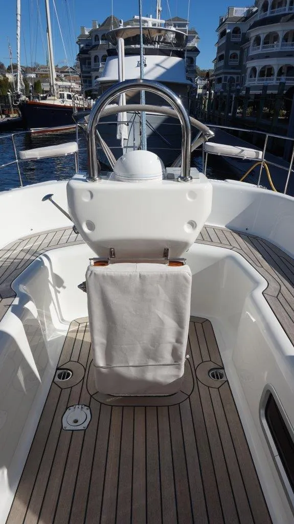 Slide: The Image of 2008 Oyster 46 yacht cockpit with steering wheel and teak decking. - 28