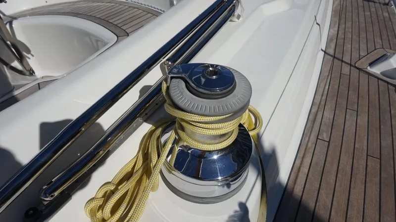 Slide: The Image of Winch with yellow rope on 2008 Oyster 46 yacht deck. - 30