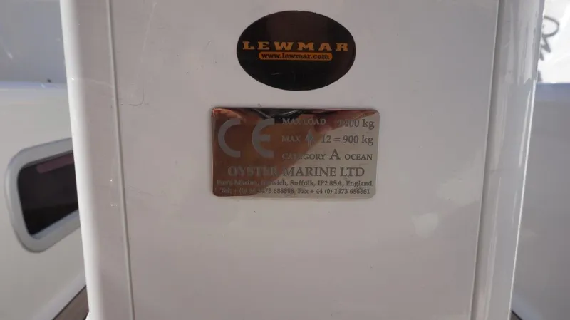 Slide: The Image of Plaque on 2008 Oyster 46 yacht, featuring Lewmar branding and specifications. - 31