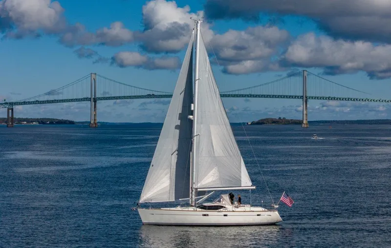 Slide: The Image of Sailing yacht Oyster 46 (2008) on open water with bridge in background. - 4