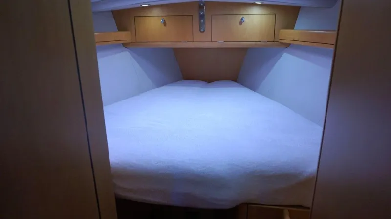 Slide: The Image of Cozy cabin interior of 2008 Oyster 46 yacht with wooden storage cabinets. - 41