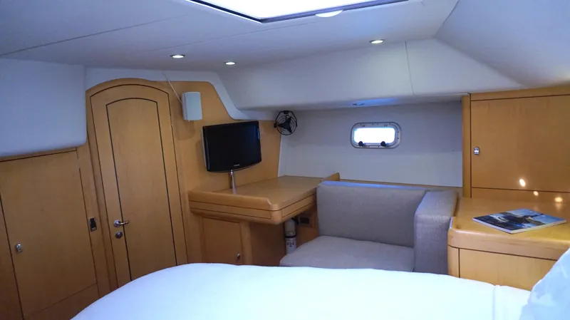 Slide: The Image of Luxurious interior of 2008 Oyster 46 yacht with cozy seating and modern amenities. - 43