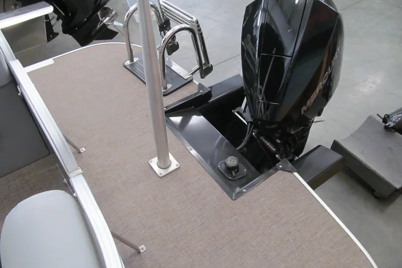 Slide: The Image of 2019 Ranger Reata 243C boat deck with Mercury outboard motor. - 24