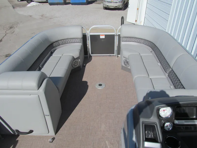 Slide: The Image of 2019 Ranger Reata 243C boat dashboard with steering wheel and control panel. - 7