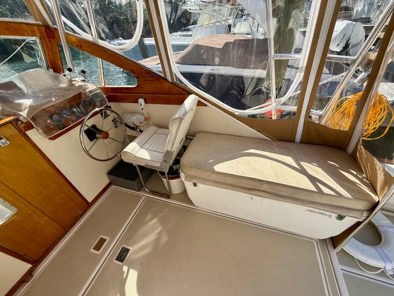 Slide: The Image of Control panel of a 1978 Dyer 29 Trunk Cabin boat with side power switch. - 13