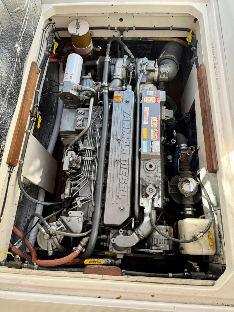 Slide: The Image of Engine compartment of a 1978 Dyer 29 Trunk Cabin boat. - 30