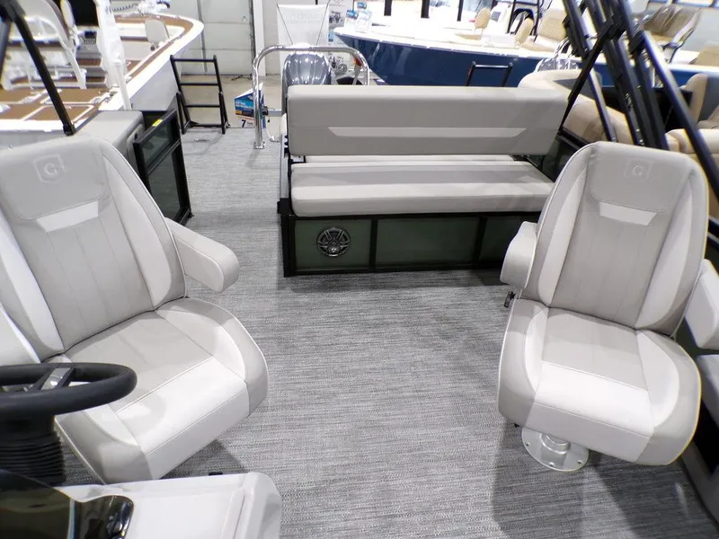 Slide: The Image of Interior of 2025 Godfrey Xperience 2286 SFLX boat with modern seating arrangement. - 15