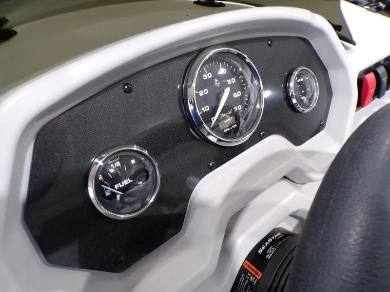 Slide: The Image of Dashboard of 2025 Godfrey Xperience 2286 SFLX boat with speedometer and fuel gauge. - 26