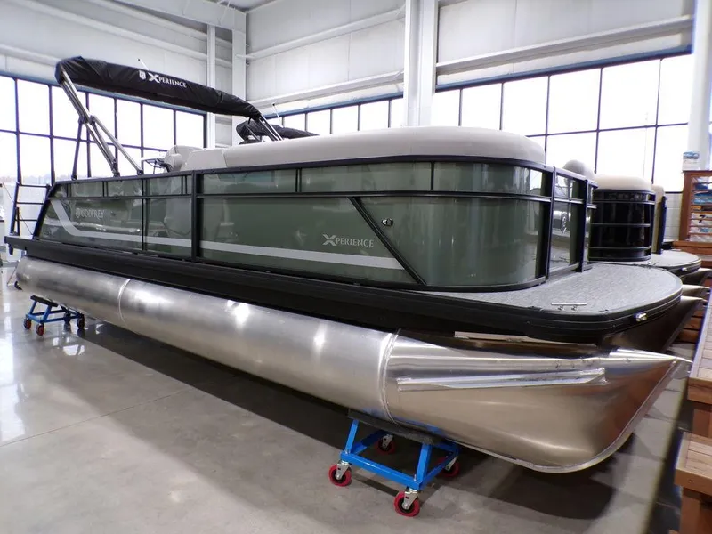 Slide: The Image of 2025 Godfrey Xperience 2286 SFLX pontoon boat with 27-inch center tube in showroom. - 7