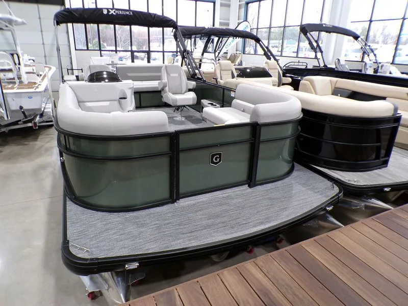 Slide: The Image of 2025 Godfrey Xperience 2286 SFLX pontoon boat with modern seating in showroom. - 8