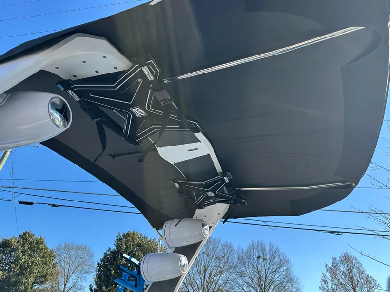 Slide: The Image of 2022 MB B52 23 Alpha boat underside with wakeboard racks and speakers. - 9