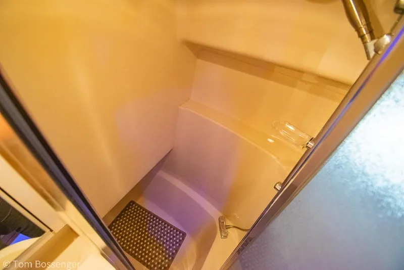 Slide: The Image of Interior shower of 2001 Bayliner 3788 Command Bridge Motoryacht, featuring modern fixtures. - 26