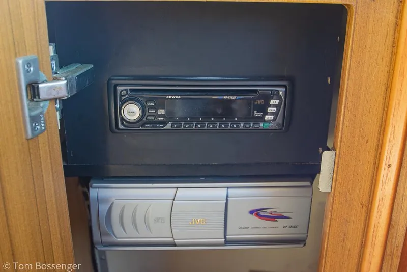 Slide: The Image of 2001 Bayliner 3788 Command Bridge Motoryacht stereo system in wooden cabinet. - 34