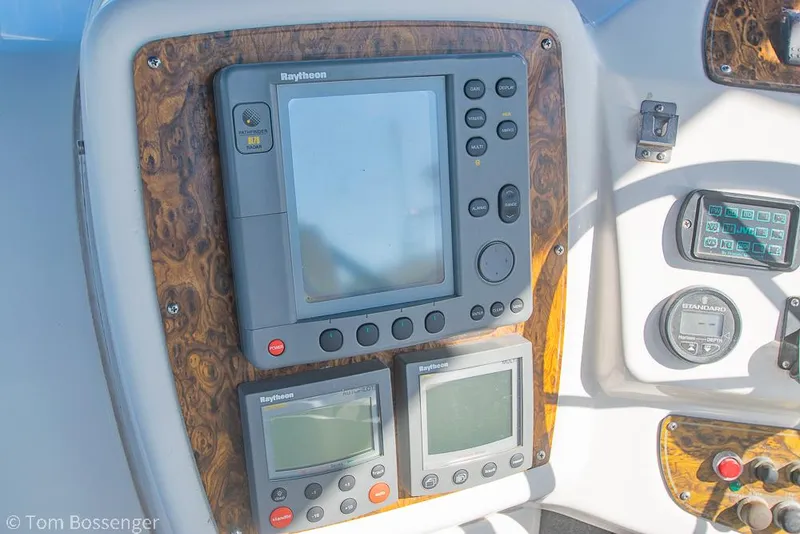 Slide: The Image of Control panel of 2001 Bayliner 3788 Command Bridge Motoryacht with navigation instruments. - 41