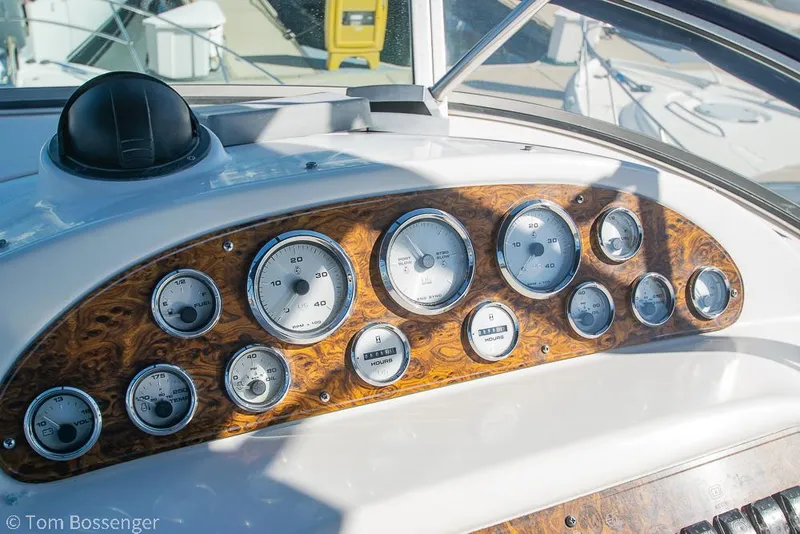 Slide: The Image of Instrument panel of 2001 Bayliner 3788 Command Bridge Motoryacht with wood finish and gauges. - 45