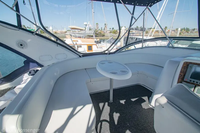 Slide: The Image of 2001 Bayliner 3788 Command Bridge Motoryacht interior with seating and table. - 48