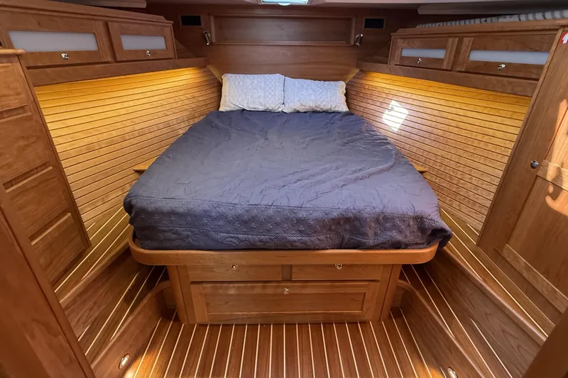 Slide: The Image of Luxurious wood-finished cabin interior of 2025 Sabre 45 Salon Express yacht. - 25
