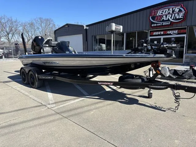 Slide: The Image of 2021 Phoenix 920 PRO XP boat on trailer at Weda's Marine dealership. - 10
