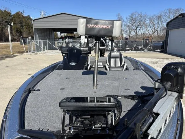 Slide: The Image of 2021 Phoenix 920 PRO XP boat, front deck view, parked outdoors. - 11