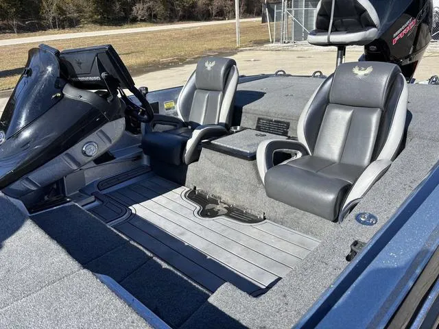 Slide: The Image of 2021 Phoenix 920 PRO XP boat interior with dual seats and steering console. - 14