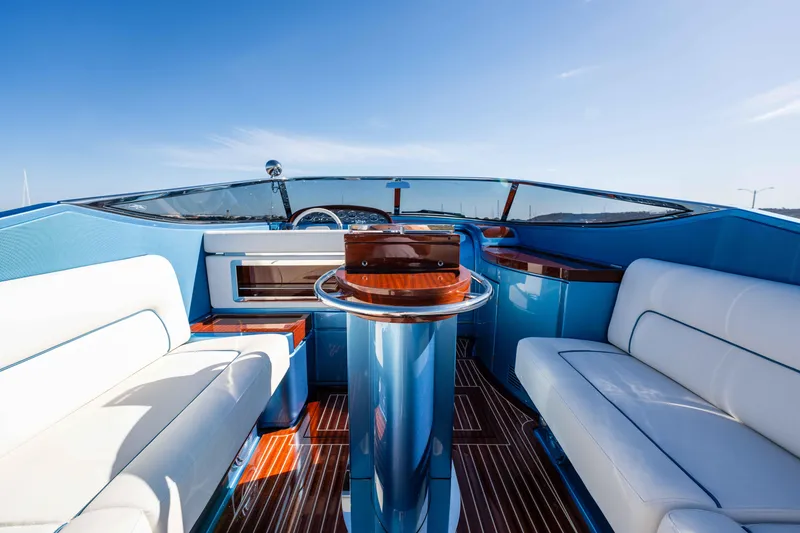 Slide: The Image of Luxurious 2025 Riva Aquariva 33 yacht interior with elegant seating and sleek design. - 16