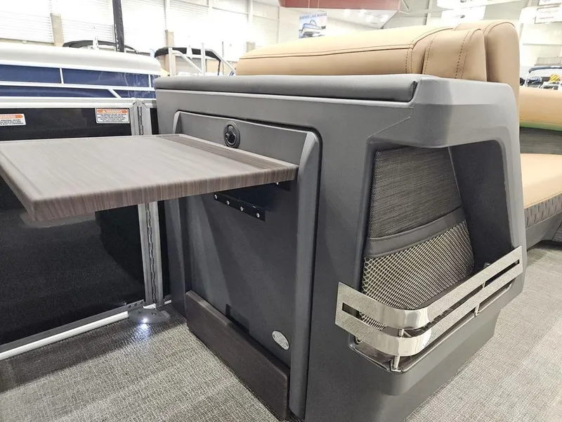 Slide: The Image of 2025 Bennington M Swingback 24 MSB interior with sleek seating and modern design features. - 12