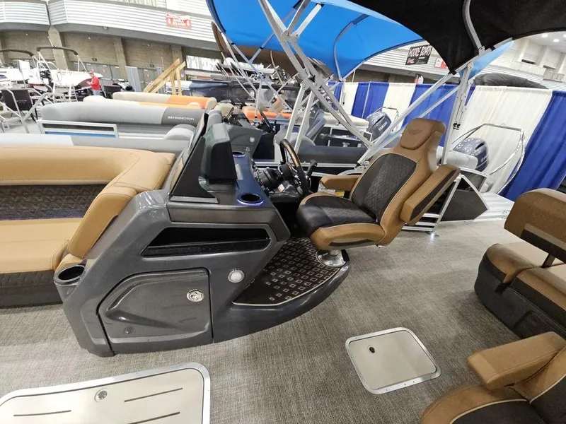 Slide: The Image of 2025 Bennington M Swingback 24 MSB interior with luxurious seating and modern helm design. - 3