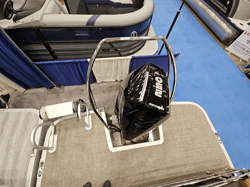 Slide: The Image of 2025 Bennington M Swingback 24 MSB boat with outboard motor, viewed from above. - 7