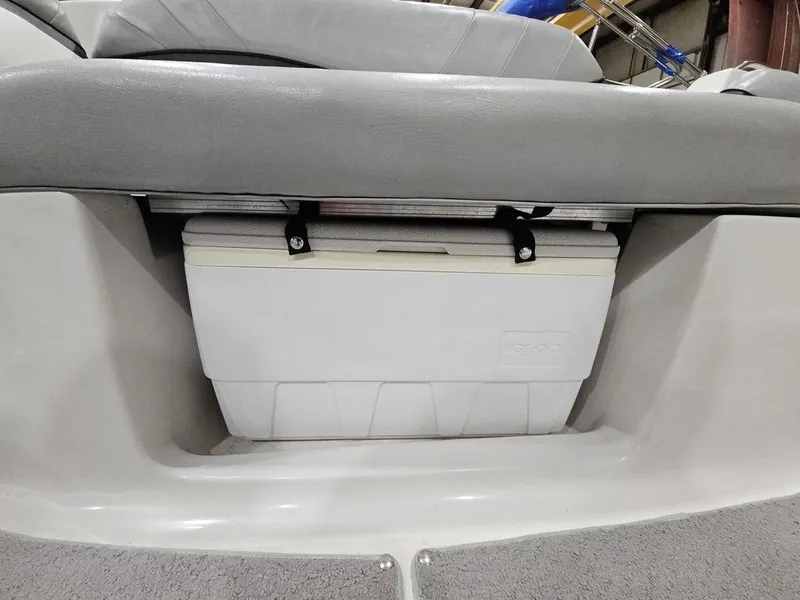 Slide: The Image of 2014 Starcraft Limited IO 2000 I/O boat with cooler storage under seat. - 15