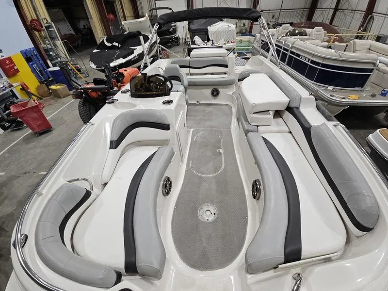 Slide: The Image of 2014 Starcraft Limited IO 2000 I/O boat interior with gray and white seating. - 3