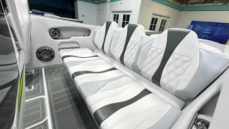 Slide: The Image of Luxurious interior of 2025 Essex Boats 28 Fusion with stylish seating and modern design. - 3