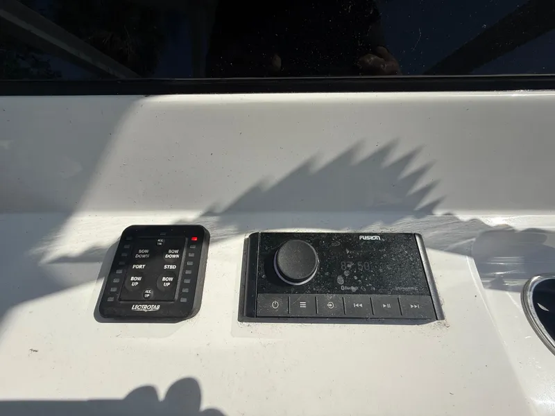 Slide: The Image of Control panel of 2023 Sportsman Open 282 Center Console boat. - 32