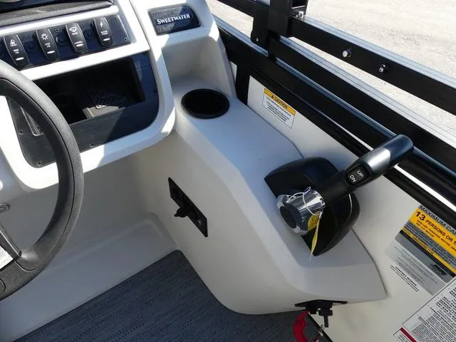 Slide: The Image of 2025 Godfrey Pontoons Sweetwater 2286 SFL helm with controls and cup holder. - 11