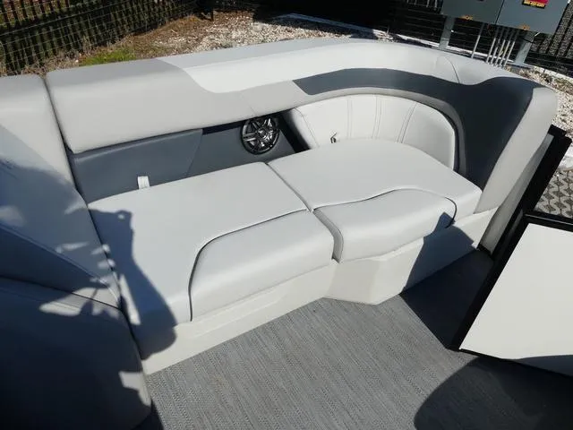 Slide: The Image of 2025 Godfrey Pontoons Sweetwater 2286 SFL interior seating with modern design and speaker system. - 18