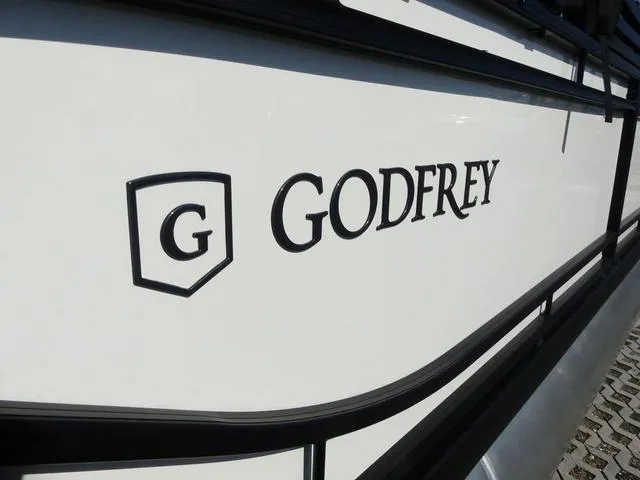 Slide: The Image of 2025 Godfrey Pontoons Sweetwater 2286 SFL logo on boat exterior. - 7