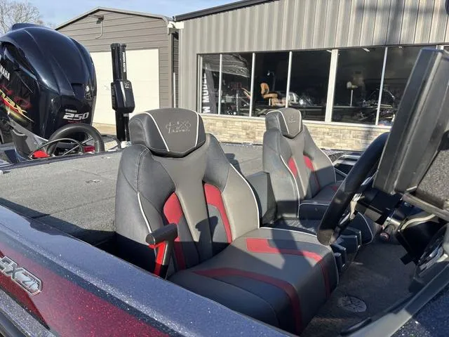Slide: The Image of 2018 Skeeter FX21 LE boat interior with Yamaha 250 engine, featuring sleek seats and modern design. - 7