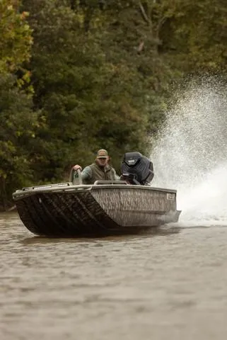 Slide: The Image of 2025 Edge Duck Boats HPSD 756DB speeding on a river, surrounded by lush greenery. - 13