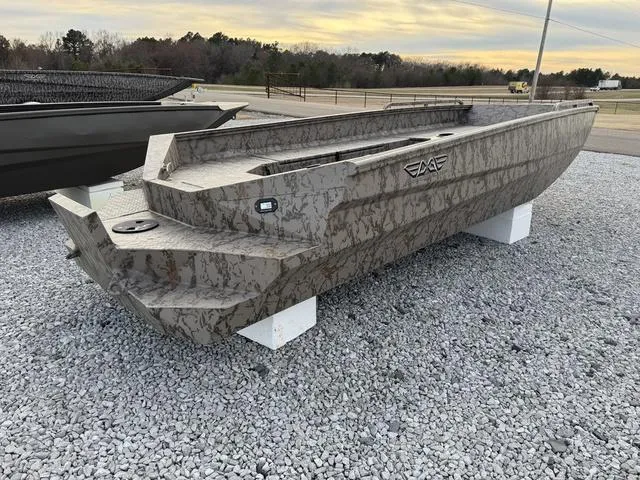 Slide: The Image of 2025 Edge Duck Boats HPSD 756DB in camouflage, displayed on gravel lot. - 4