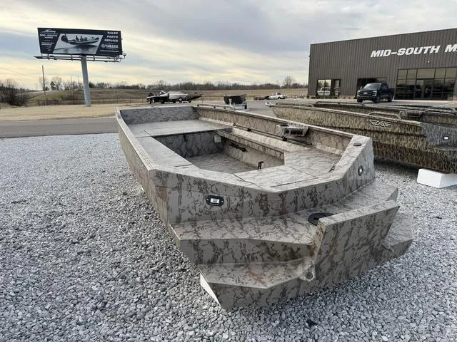 Slide: The Image of 2025 Edge Duck Boats HPSD 756DB on gravel lot near dealership, showcasing rugged design. - 5