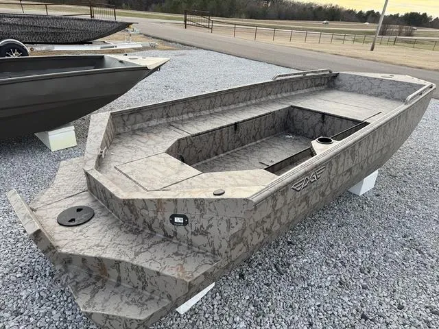 Slide: The Image of 2025 Edge Duck Boats HPSD 756DB in camouflage design on gravel lot. - 9