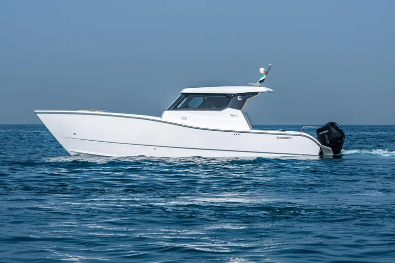 Slide: The Image of 2026 SilverCAT 34HT boat cruising on open water. - 3