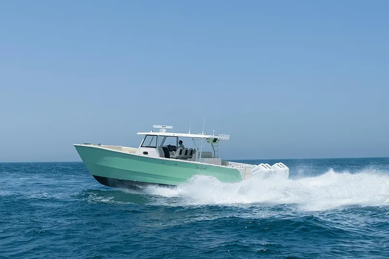 Slide: The Image of 2026 SilverCAT 40CC ULTRA boat cruising on open sea. - 4