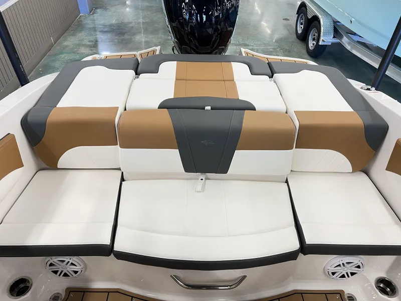 Slide: The Image of 2023 Chaparral 21SSi OB SPORT boat interior with stylish seating and modern design. - 4