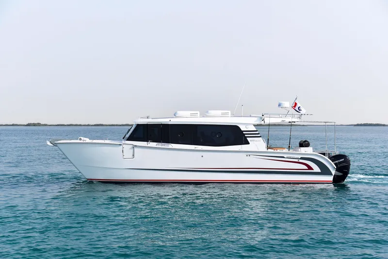 Slide: The Image of SilverCAT 40LUX 2026 luxury yacht cruising on calm blue waters. - 0