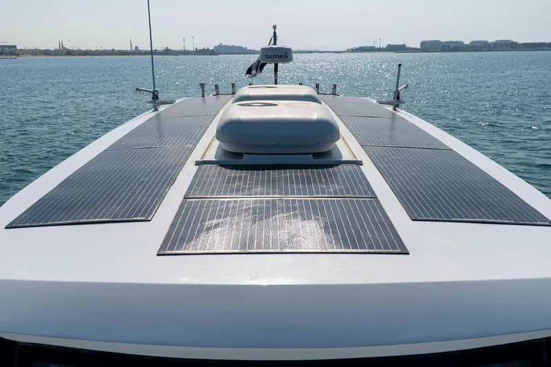 Slide: The Image of SilverCAT 40LUX 2026 yacht with solar panels on deck, cruising on calm waters. - 9