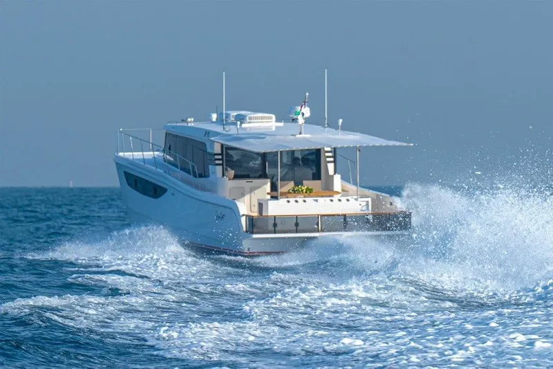 Slide: The Image of Luxury SilverCAT 46LUX yacht cruising on open sea, 2026 model. - 3