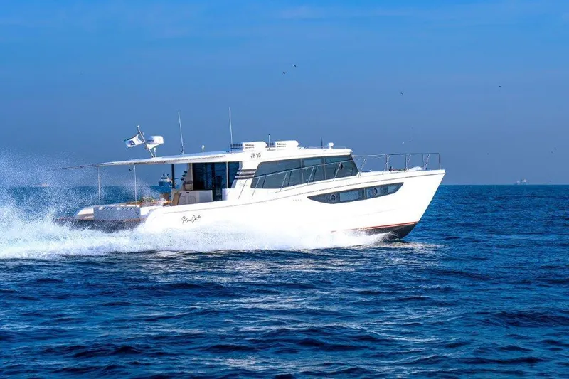 Slide: The Image of Luxury SilverCAT 46LUX yacht cruising on open sea, 2026 model. - 9